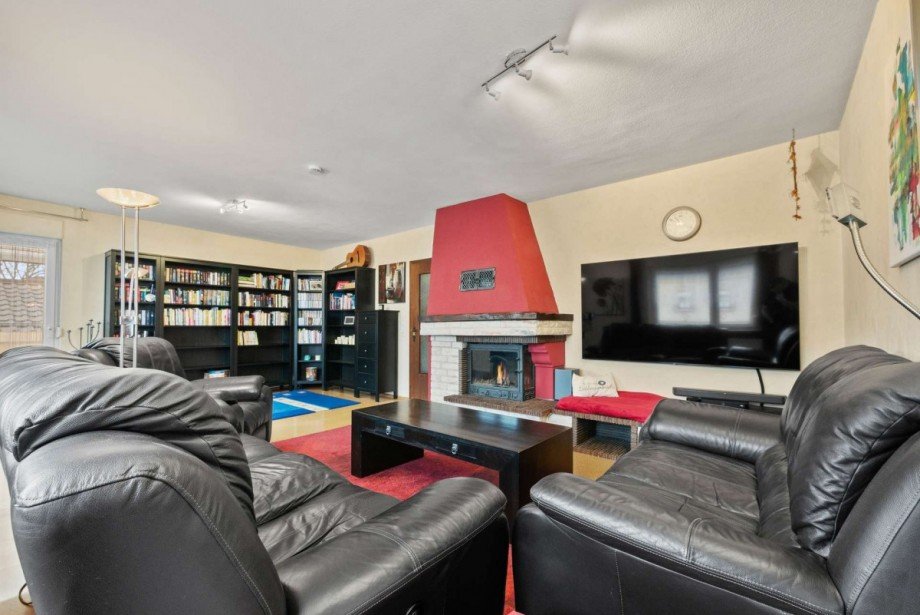 Wohnzimmer mit Kamin Haus Okriftel