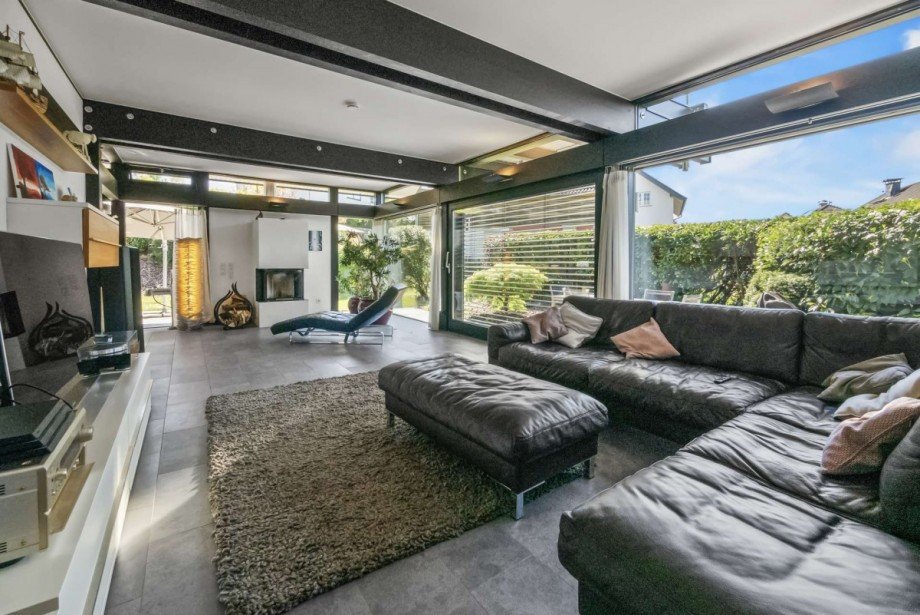 Wohnzimmer mit Kamin Einfamilienhaus Niedererbach