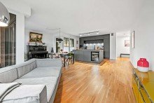 Offenes Wohnzimmer Hochwertige 5-Zimmer Wohnung mit EBK, Garten, Terasse, Stellplatz und Ausblick auf den Main